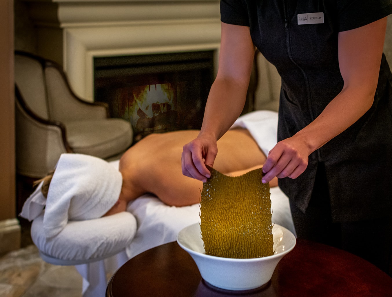 woman getting a seaweed treatment massage at one of the top Canada spas