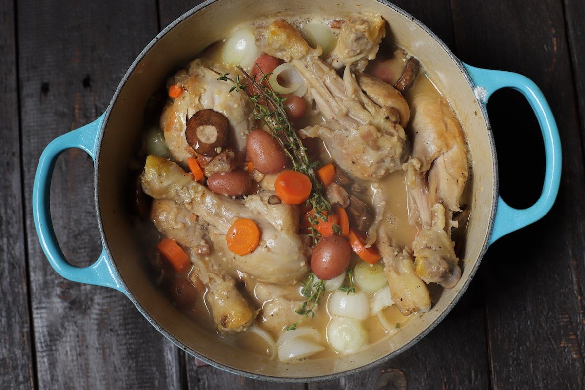 chicken stew in blue pan