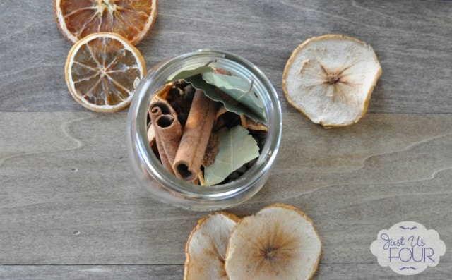 Cinnamon and dried fruit in a mason jar.