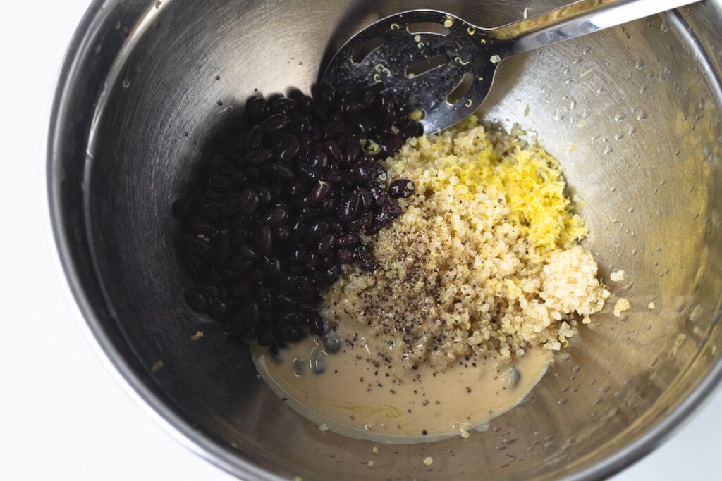quinoa, tahini, black beans, lemon zest and juice and spices