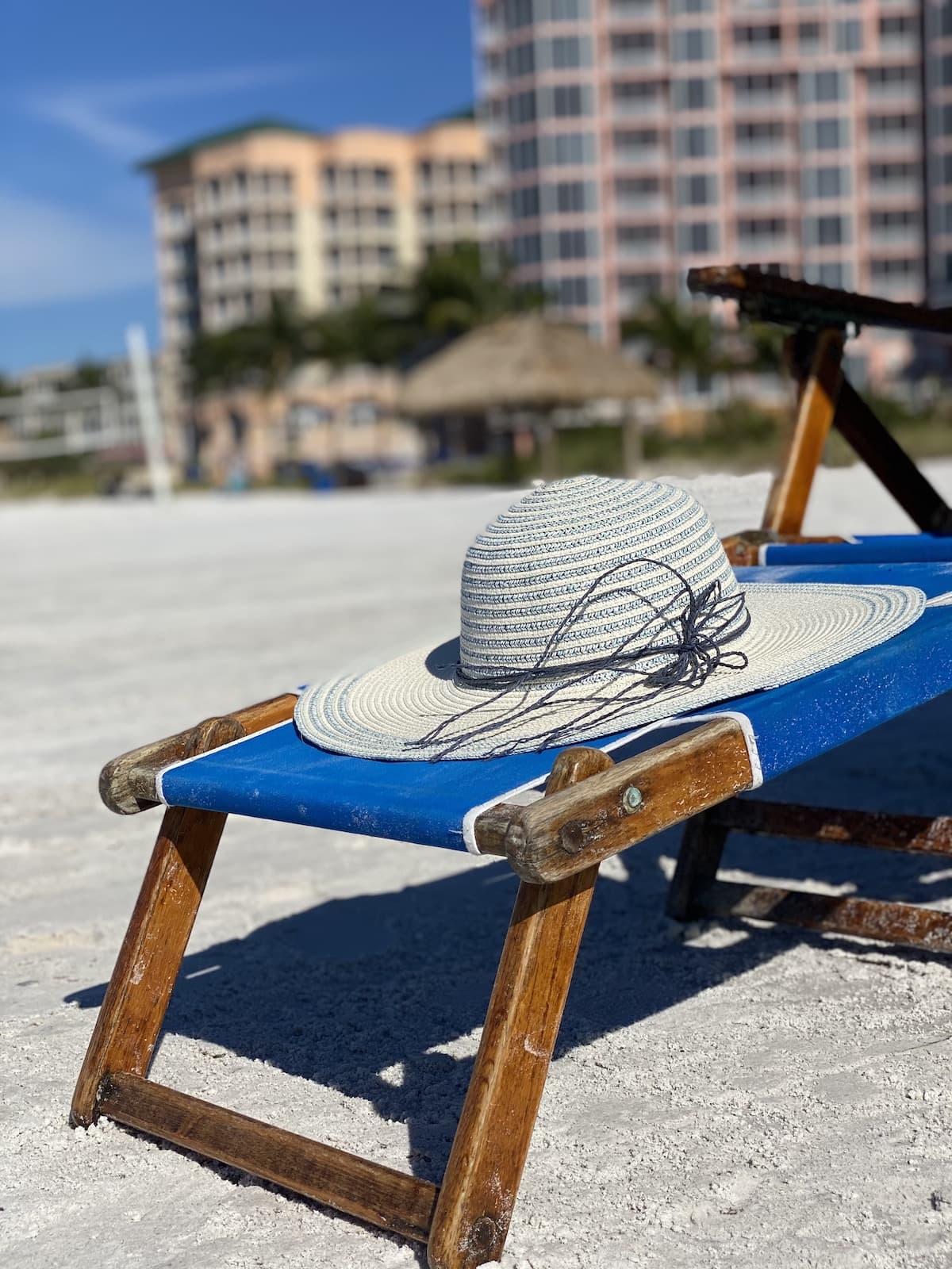 Pink shell hat on beach chair