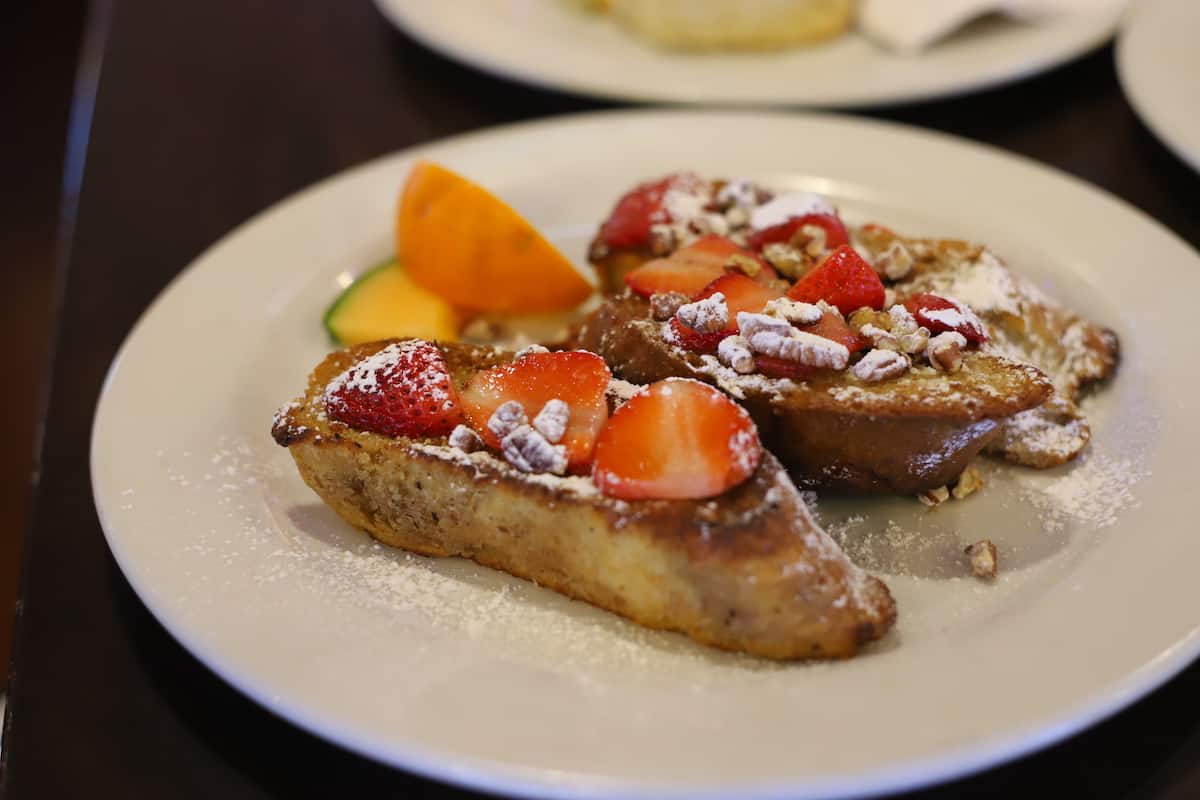 French toast on a white plate.