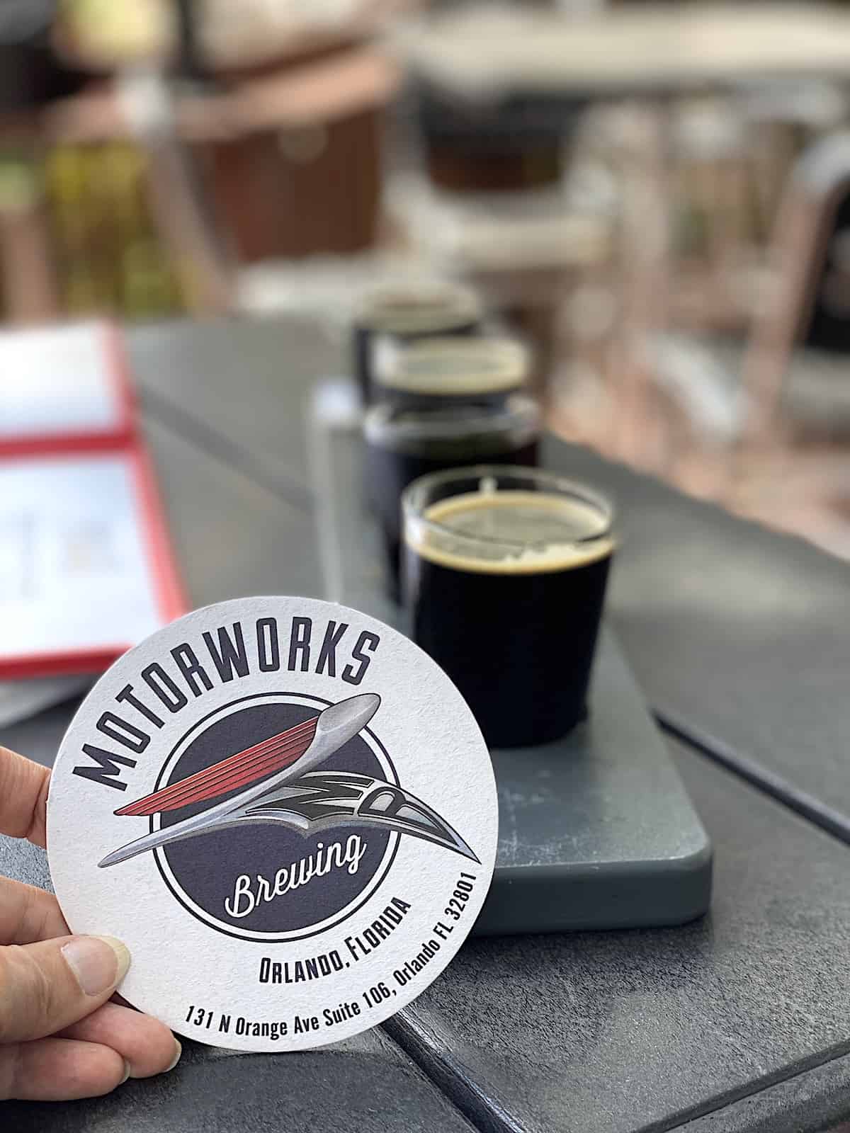 Motorworks coaster in front of a beer flight.