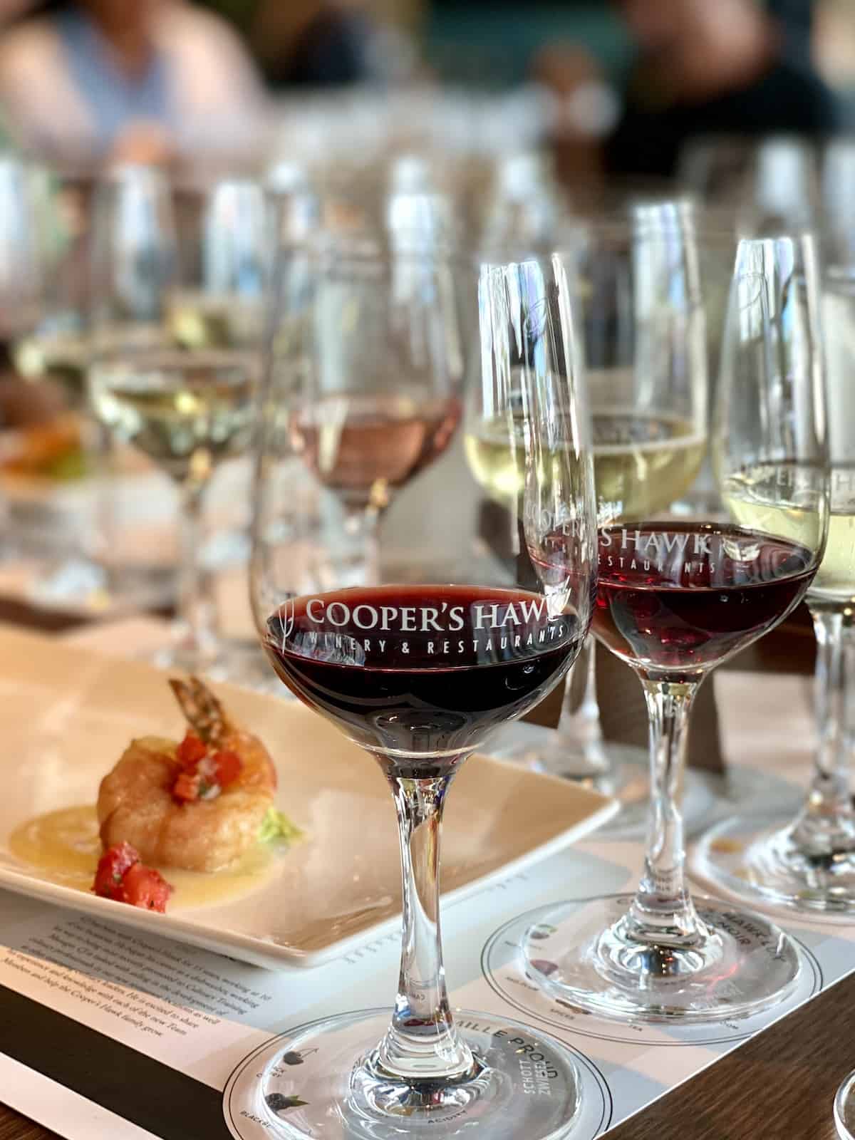 Wine glasses and shrimp appetizer at Cooper's Hawk Winery