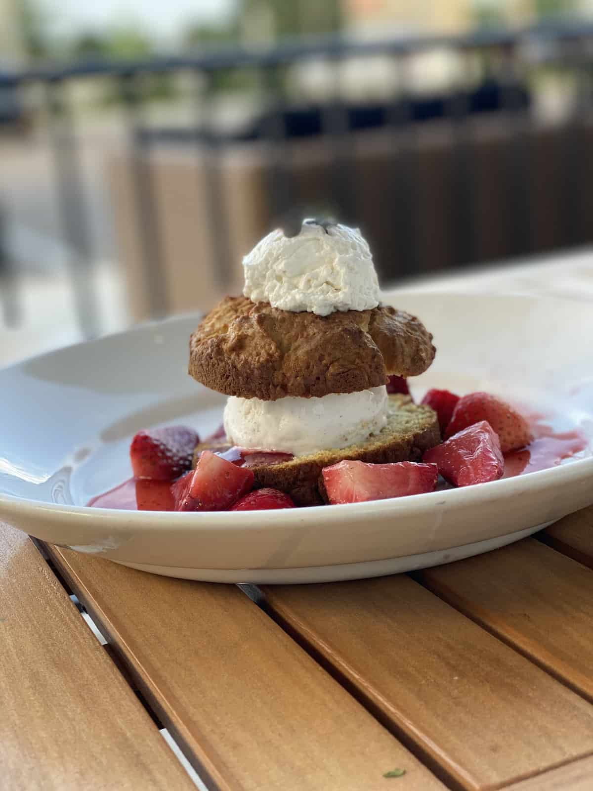 Strawberry shortcake with shipped cream.