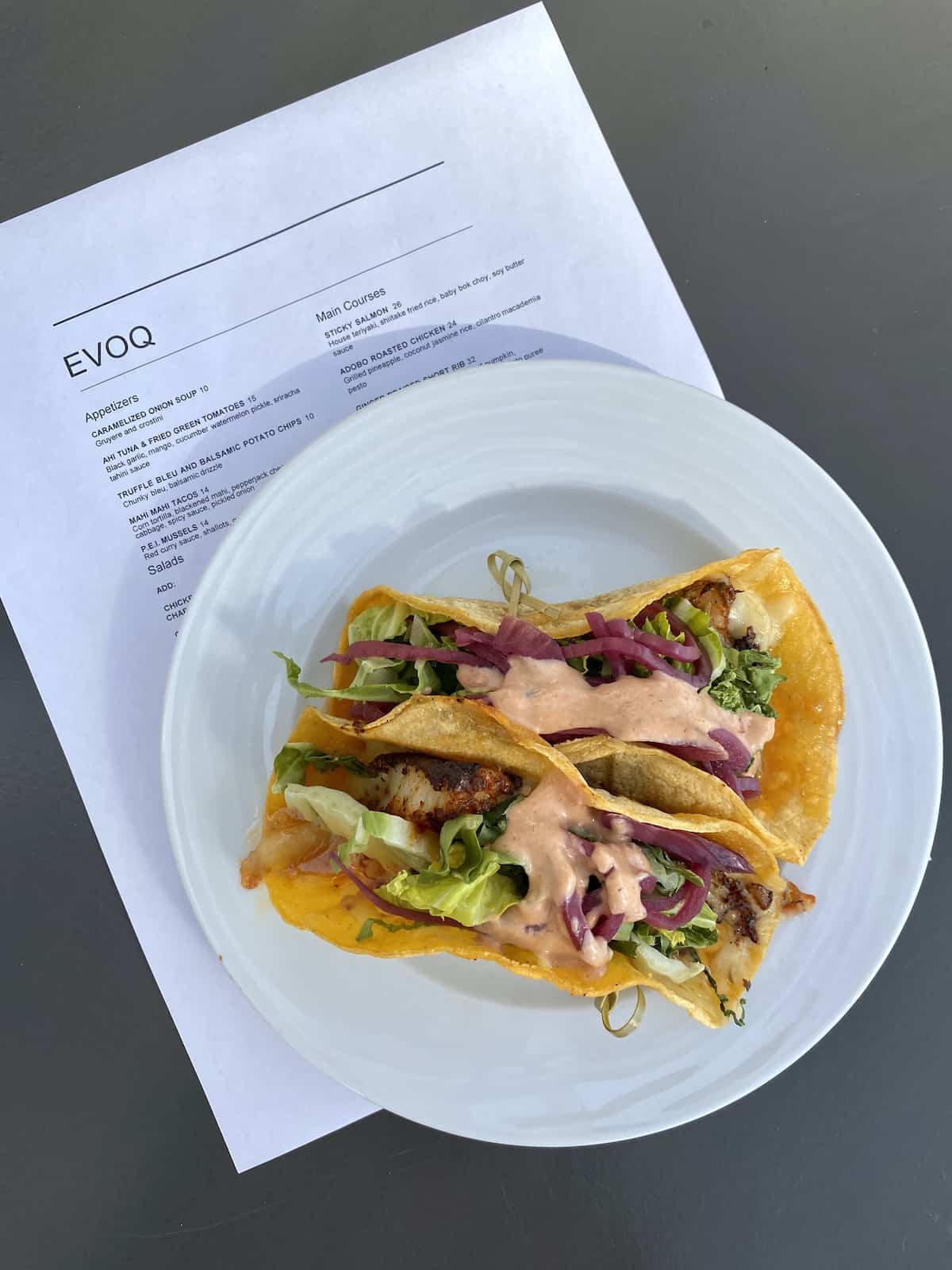 Fish tacos with spicy sauce at Evoq restaurant in Sarasota