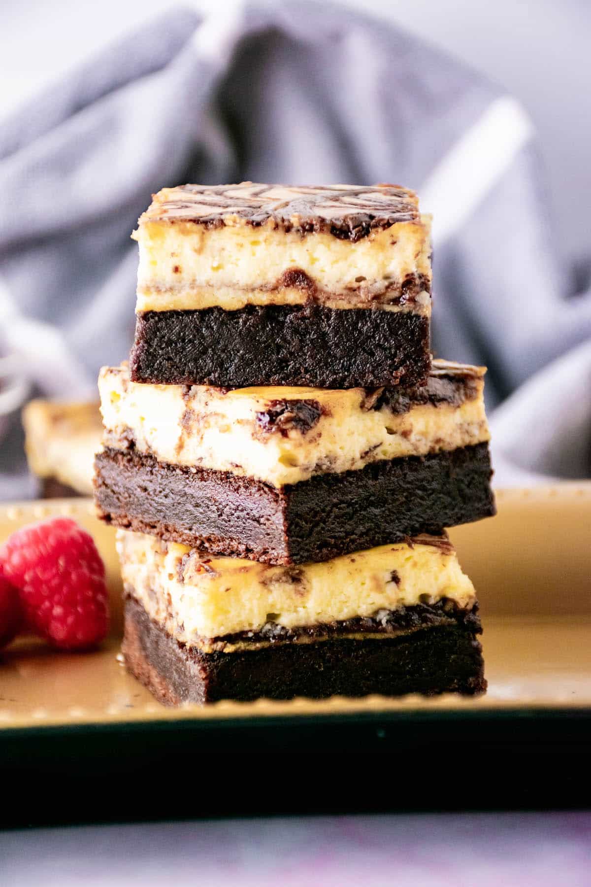 Nutella bars stacked on a light brown plate.