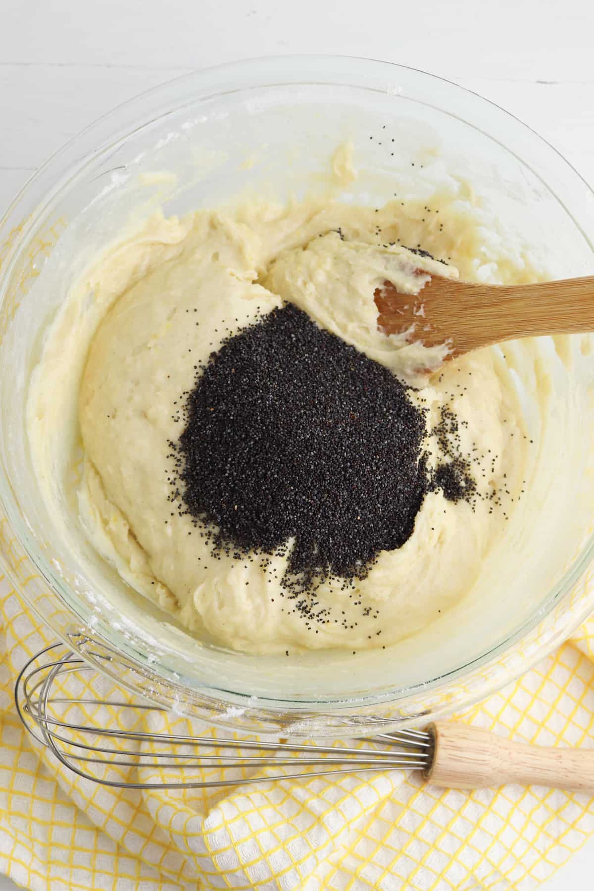 Batter with poppy seeds.