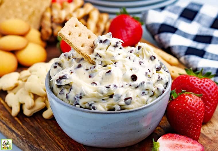 Chocolate chip cookie dough dip in a blue bowl.