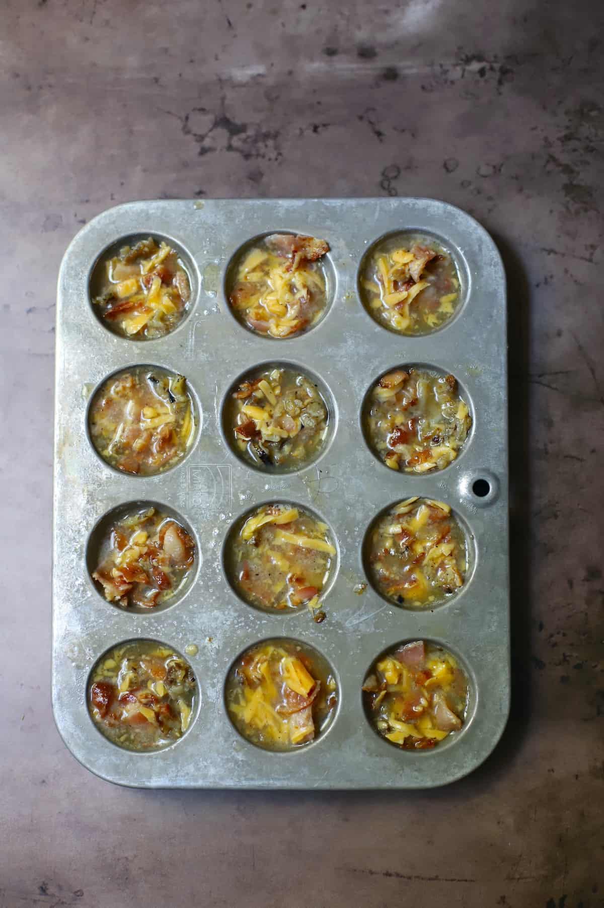 Egg bites in a mini muffin tin.