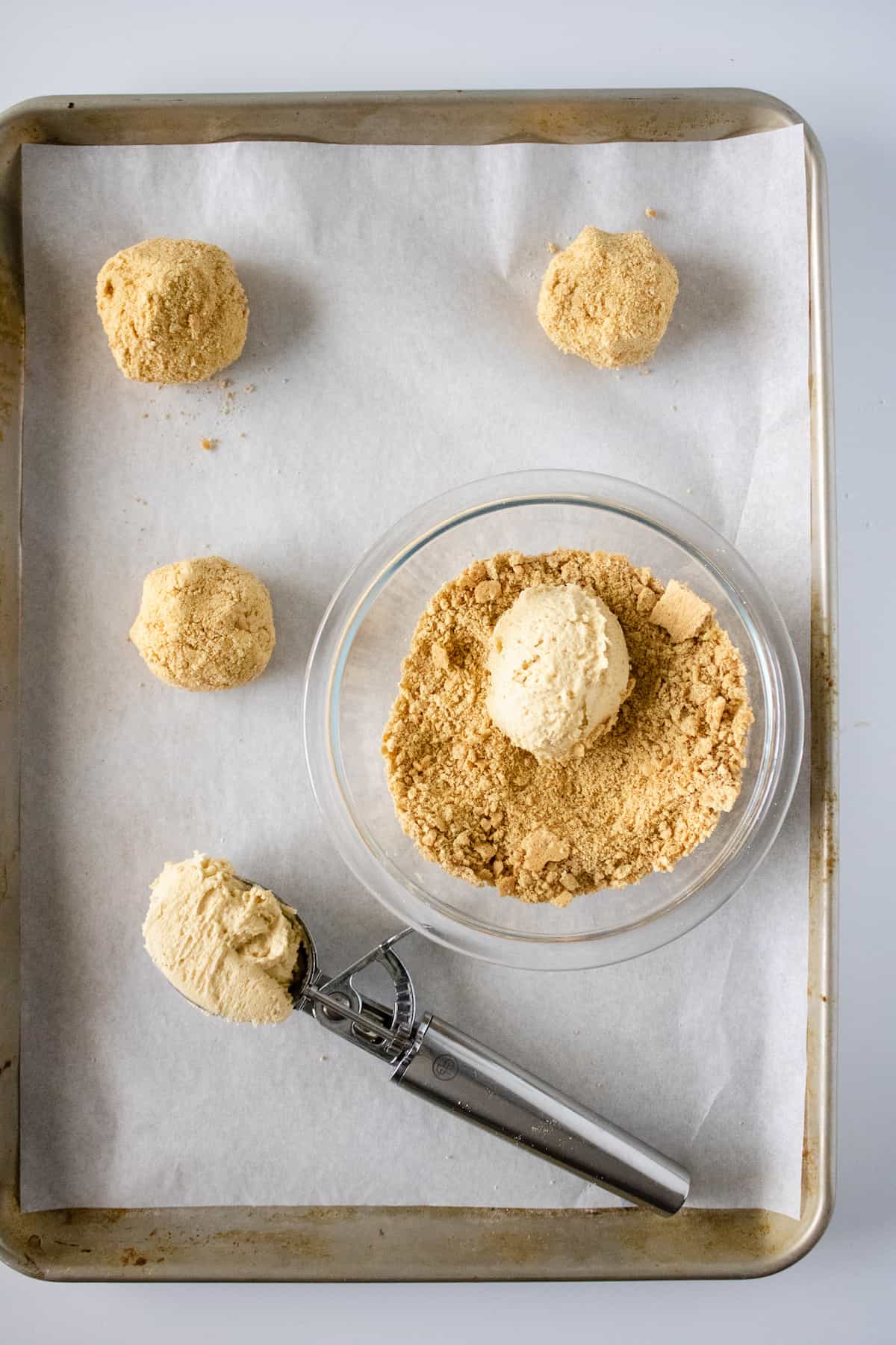 Ball of cookie dough rolled in graham cracker crumbs.