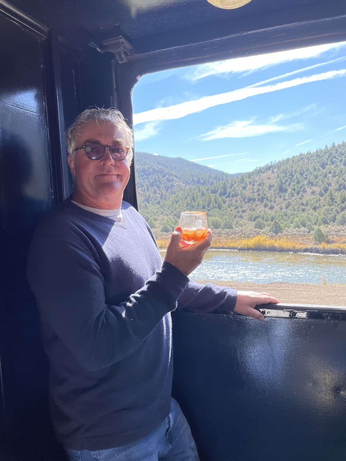 Man drinking Bloody Mary.