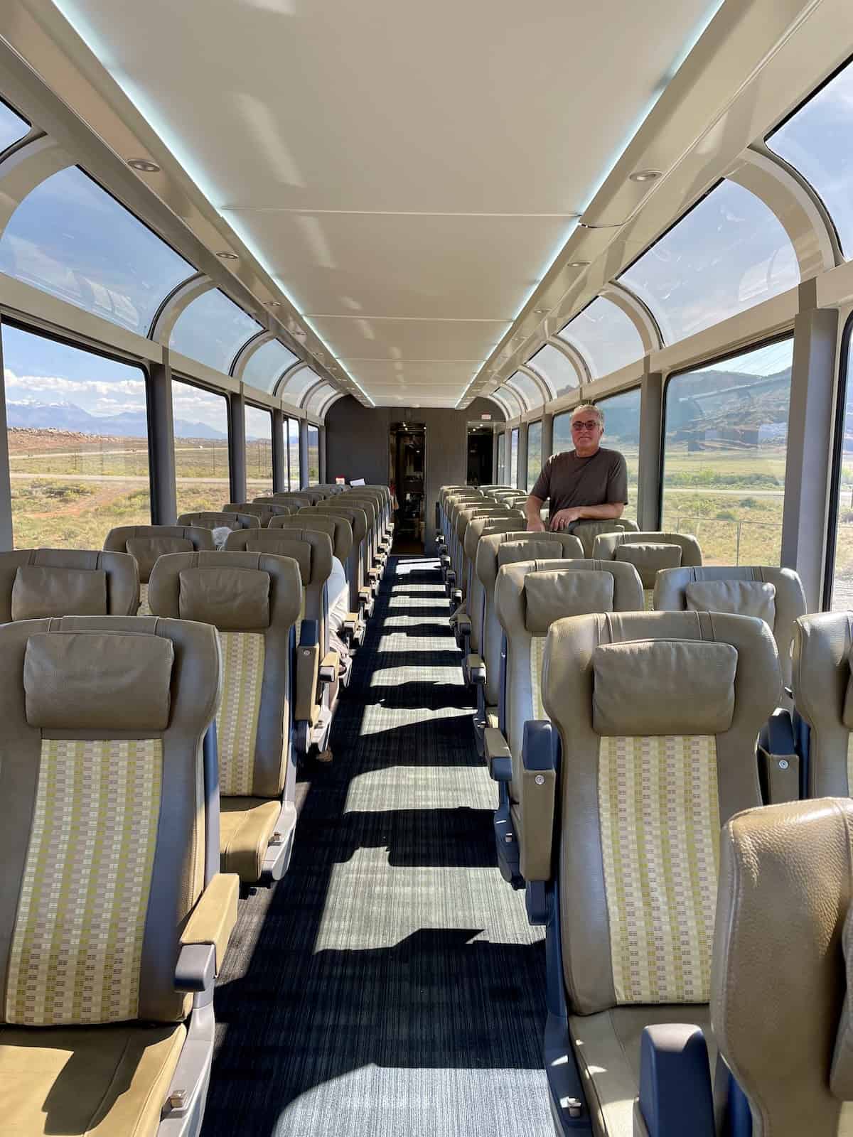 Man inside Rocky Mountaineer train.