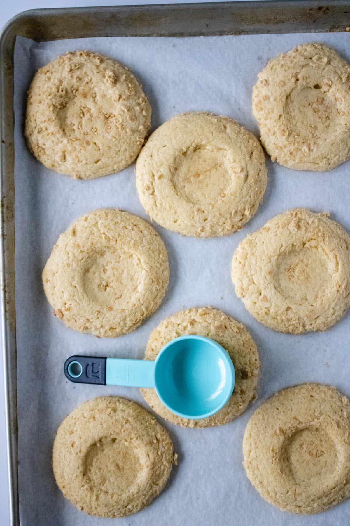 Key Lime Crumbl cookies on baking sheet.