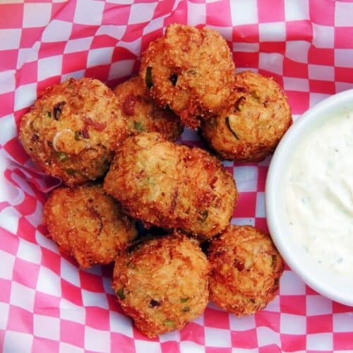 Crab puppies on red and white check paper.