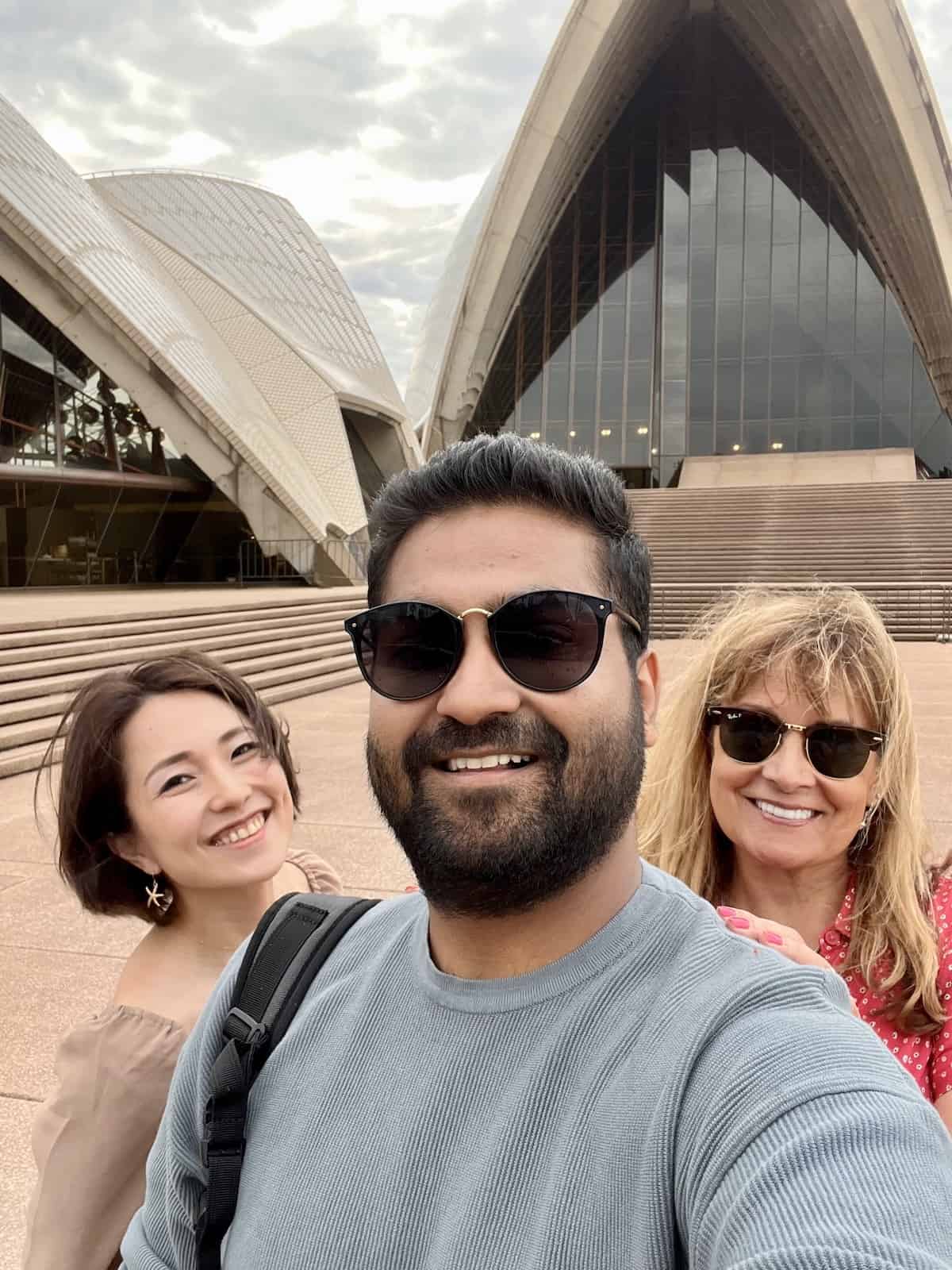 People in front of the Sydney Opera House.