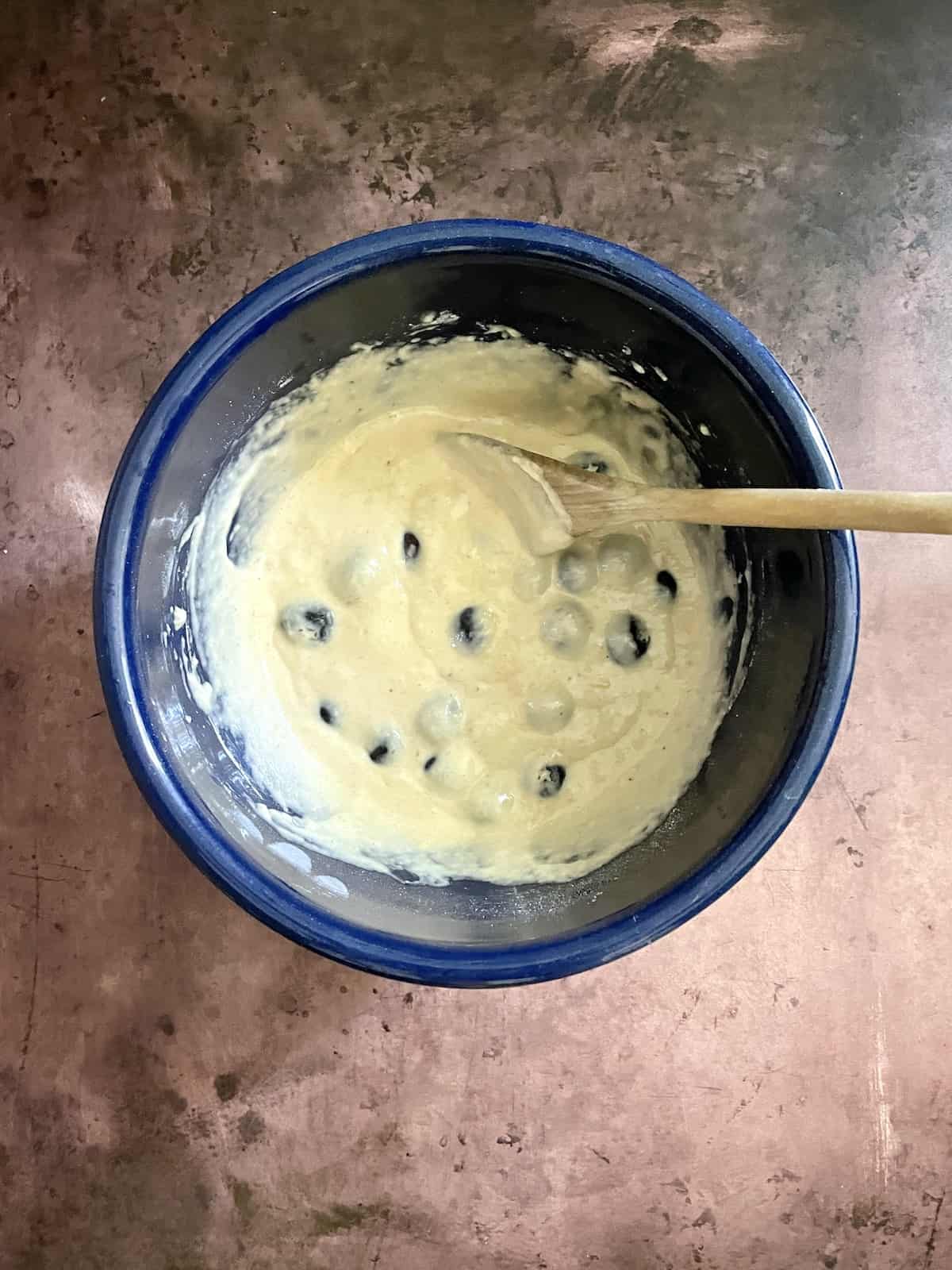 Batter with blueberries.