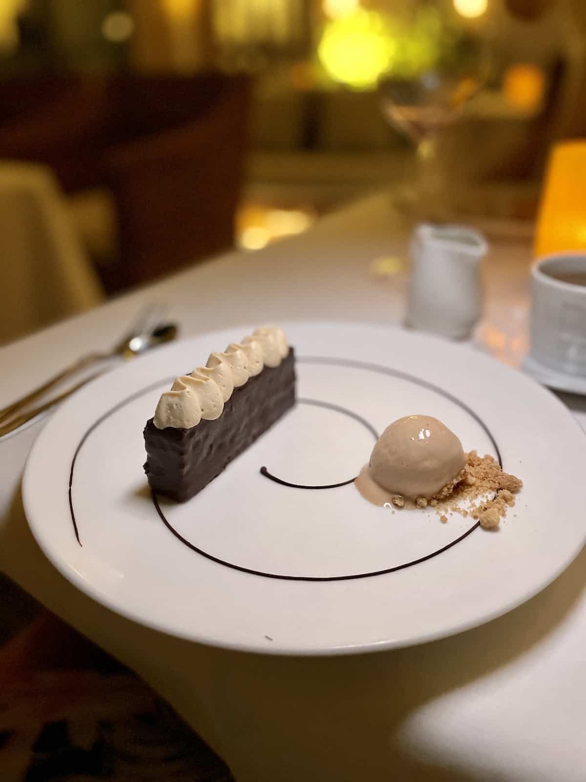 Plate with cake and scoop of ice cream.