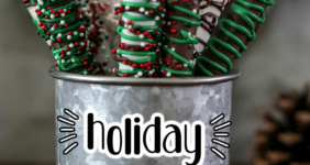 Holiday decorated chocolate covered pretzels in a silver coffee tin for Pinterest.