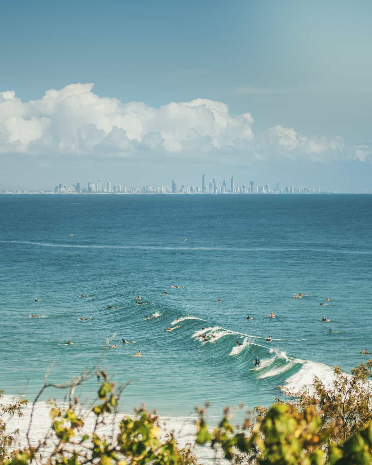Surfers taking a wave in Australia.