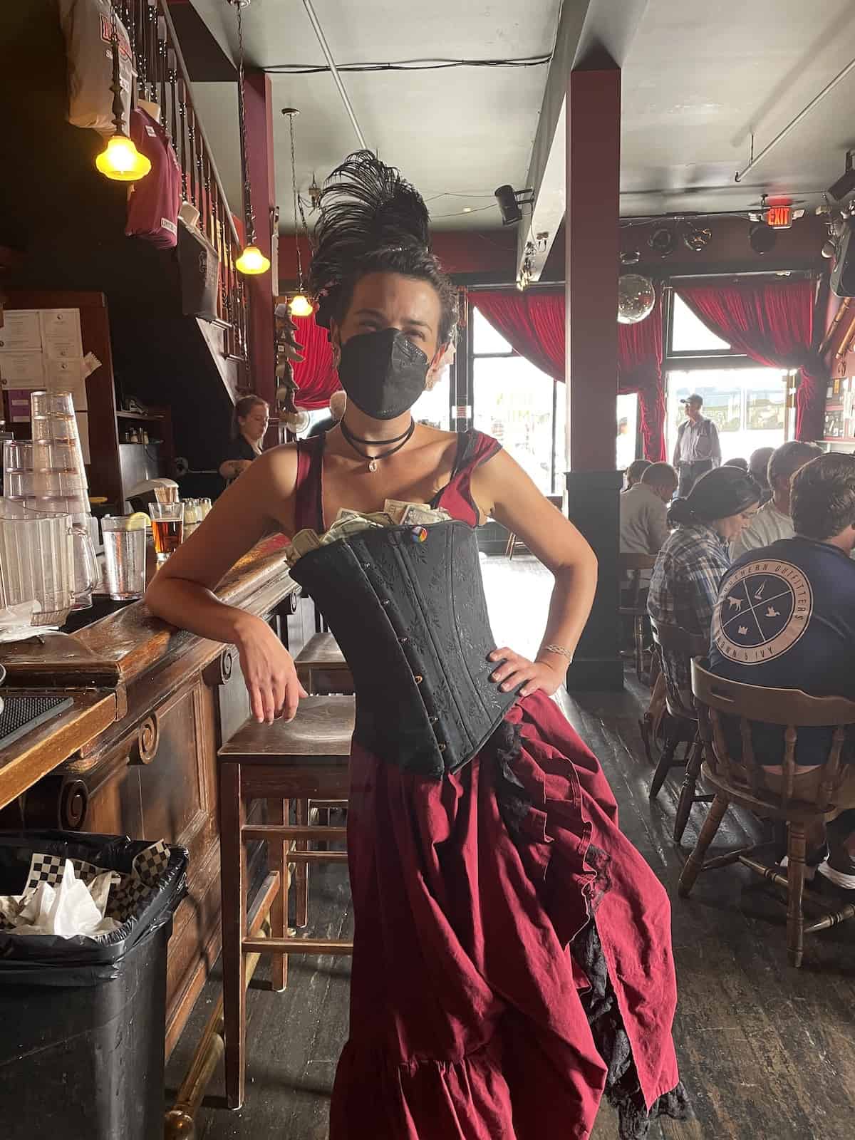 Bartender in old historic clothing.