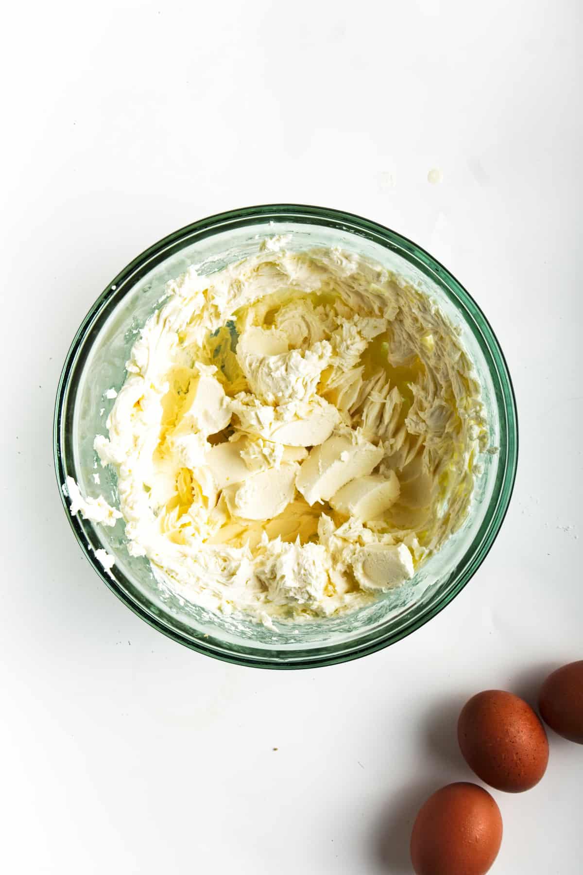 Cream cheese in glass bowl.