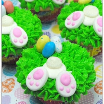 Cupcakes make to look like bunny butts in the grass.