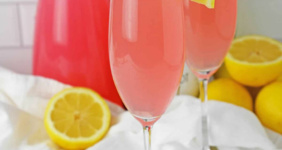 Pink drink in a champagne flute.