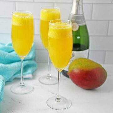 Mango mimosa in a champagne flute.