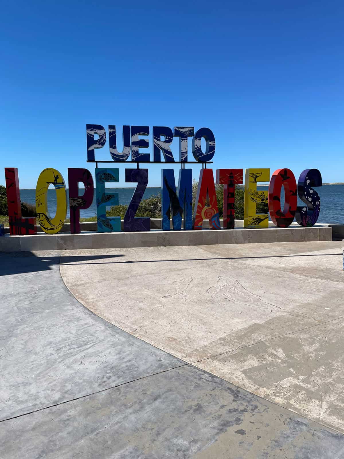 Sign for Puerto Lopez Mateos in Baja Mexico.