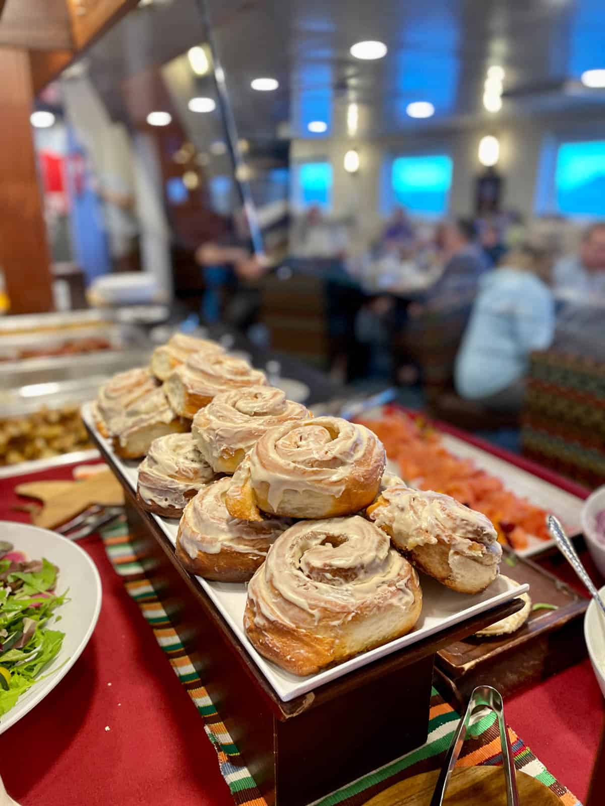 Cinnamon rolls on buffet.