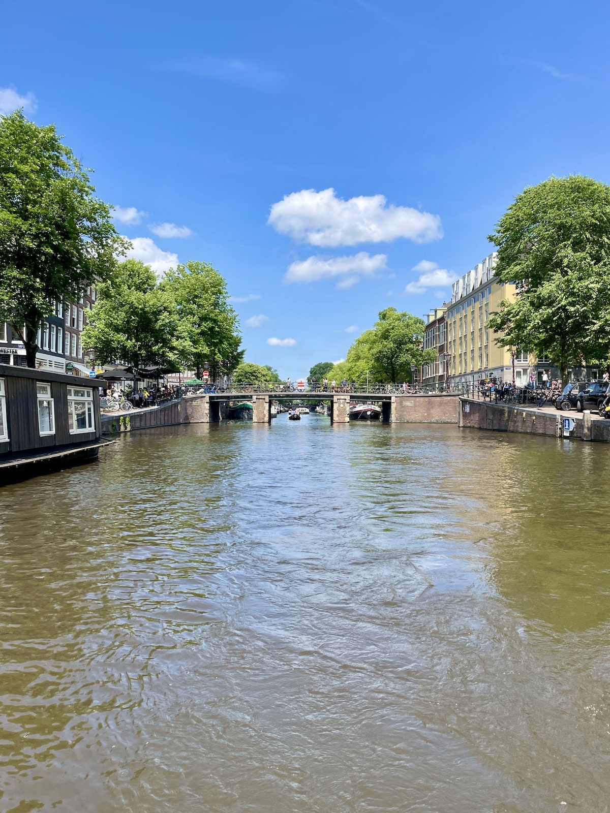 Canal with blue sky in Amsterdam.