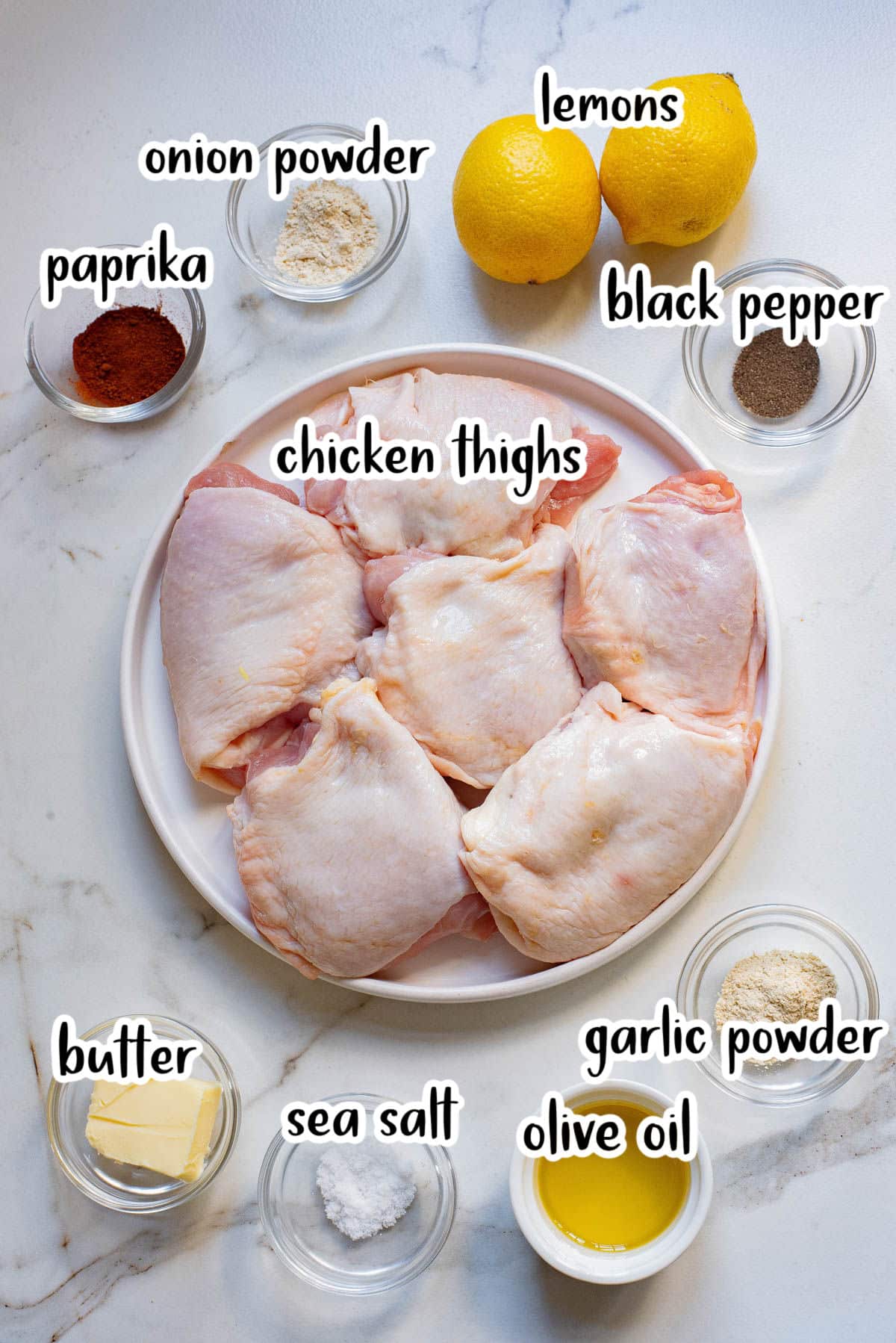 Ingredients to make Greek chicken thighs.