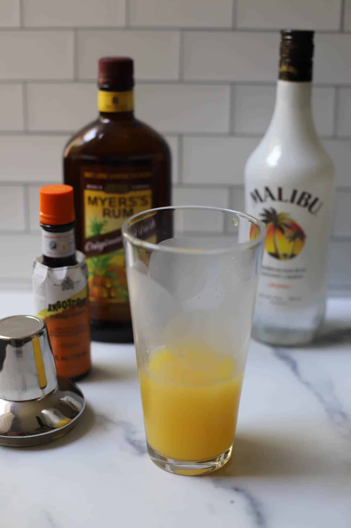 Juice in a cocktail shaker. 