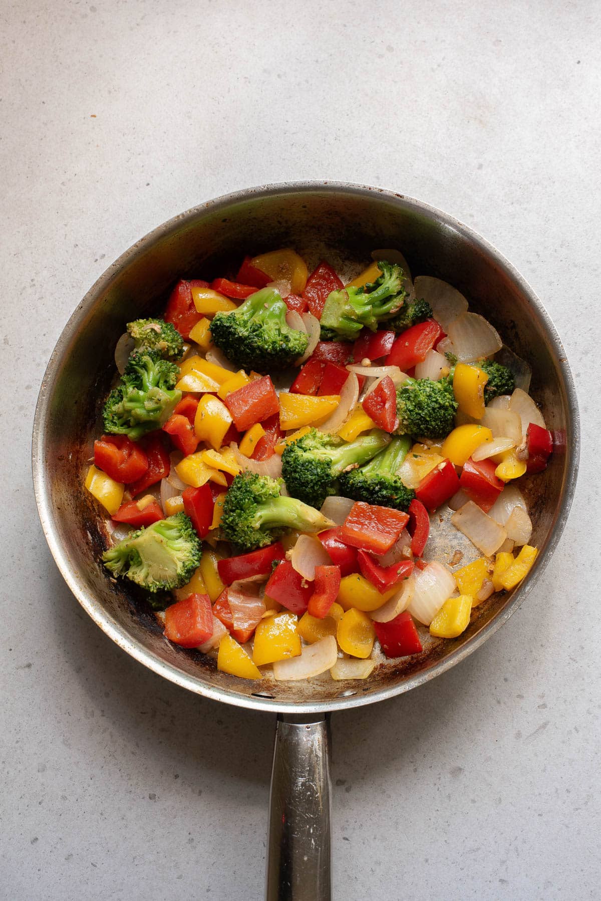 Vegetables for stir fry in pan.