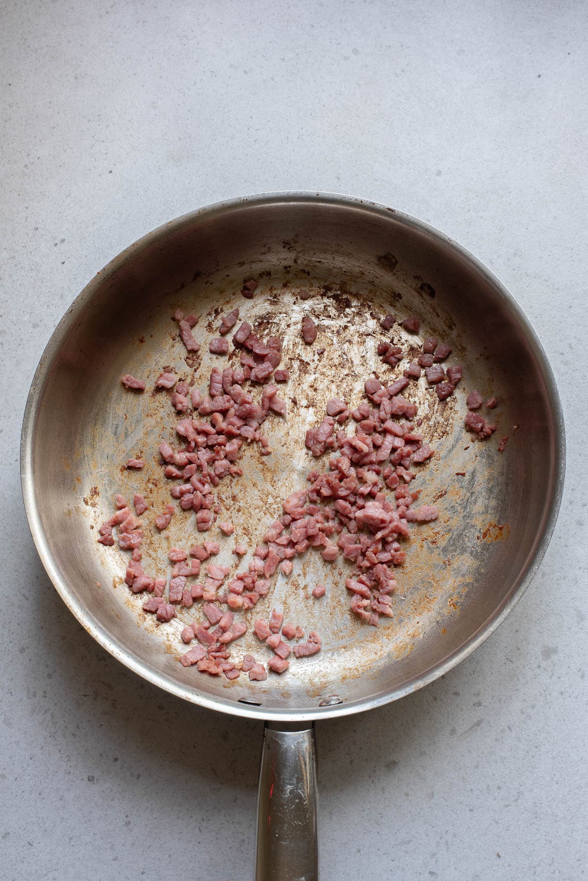 Bacon in a frying pan.