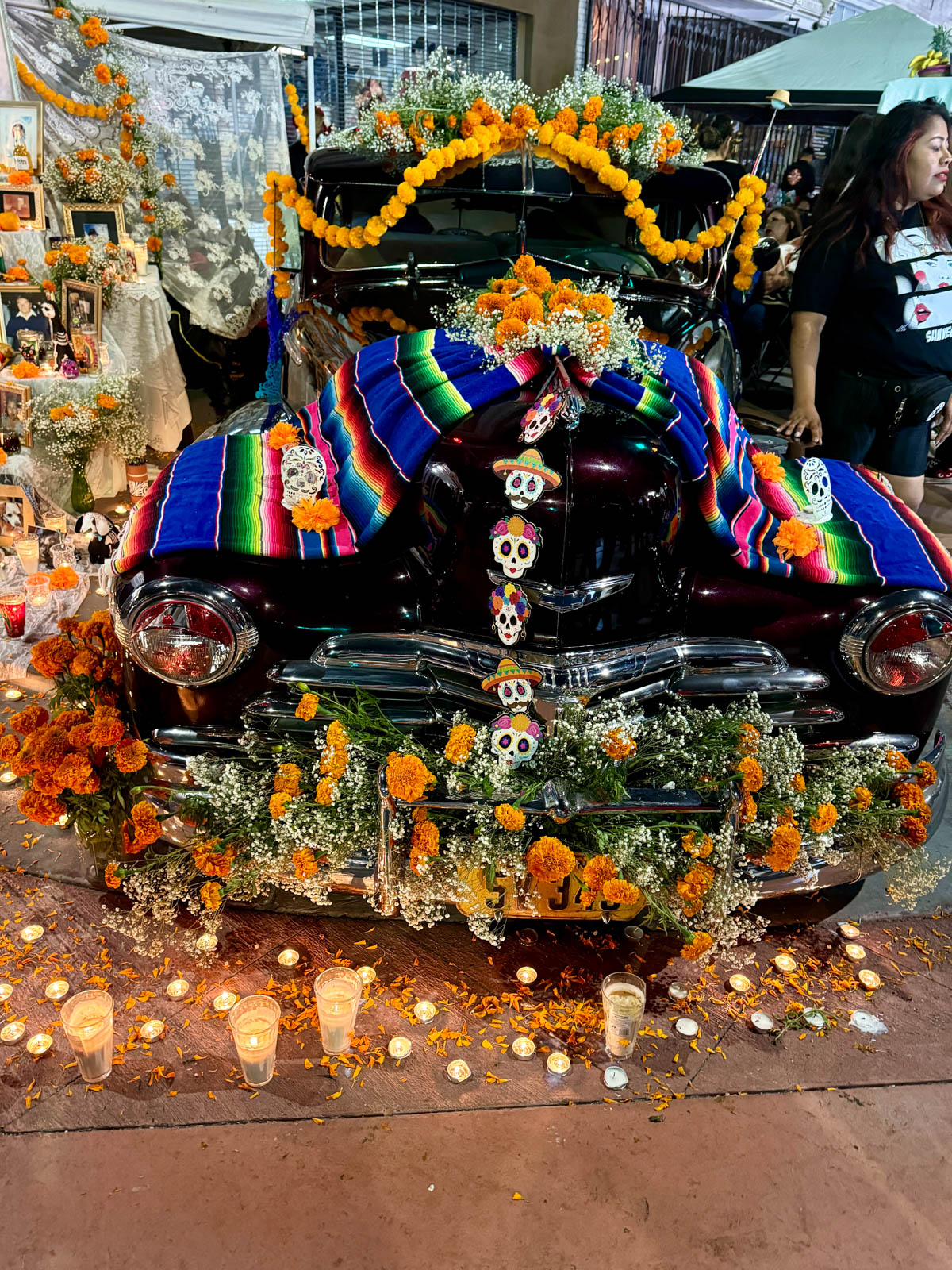 Car decorated for day of the dead festival.