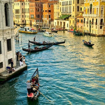 Gondolas on a busy canal.