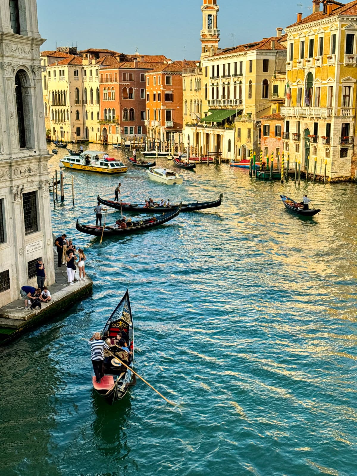 Gondolas on a busy canal.