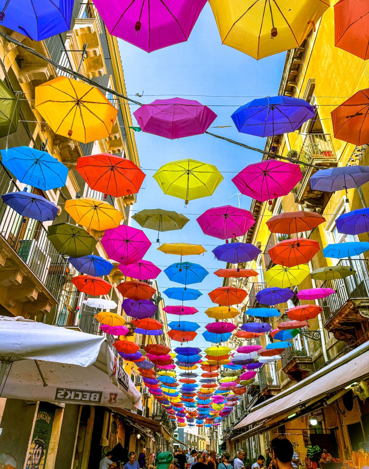 Colorful umbrellas over a market.