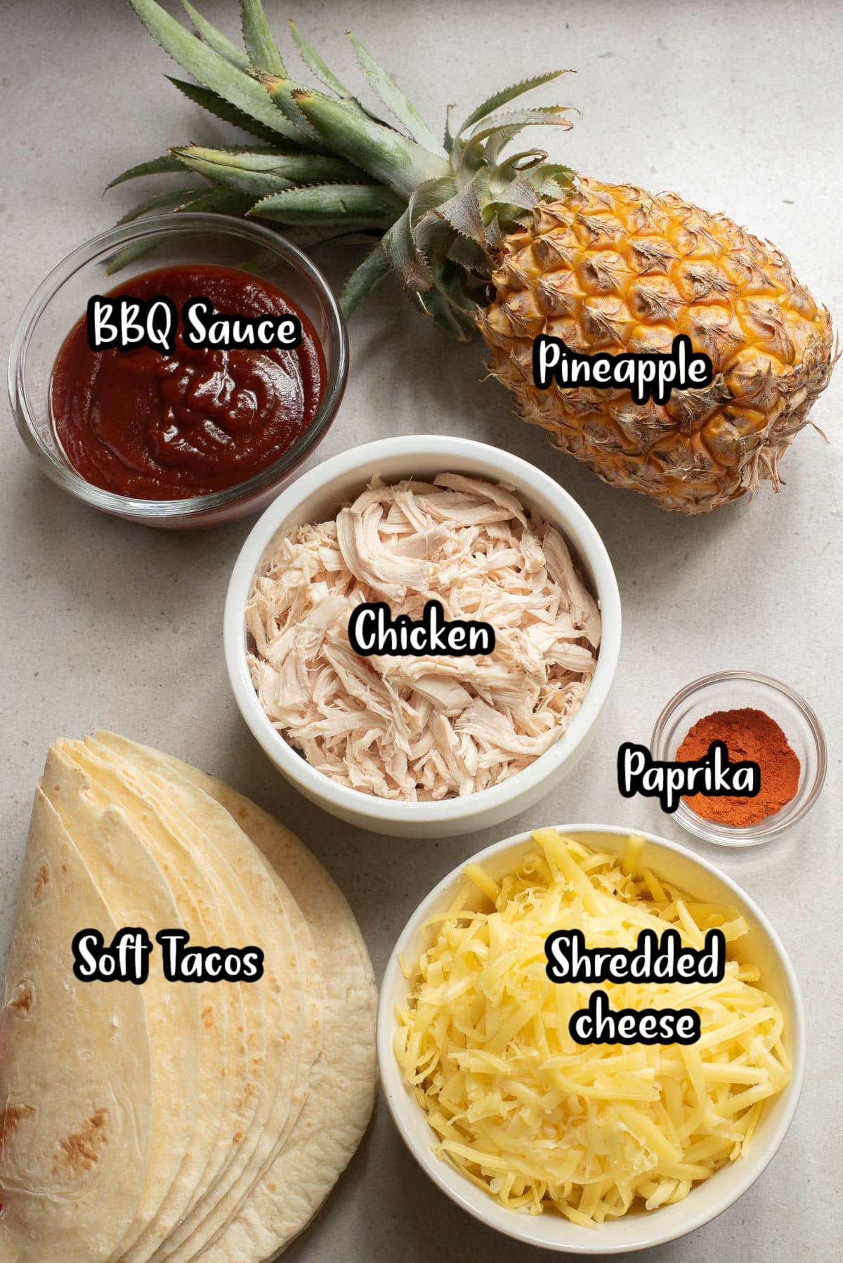 Ingredients to make chicken quesadillas on a counter.