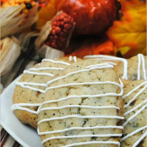 Pumpkin spice latte cookies with fall leaves in background.