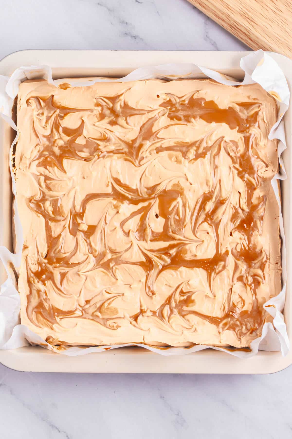 Cheesecake with swirls of dulce de leche.