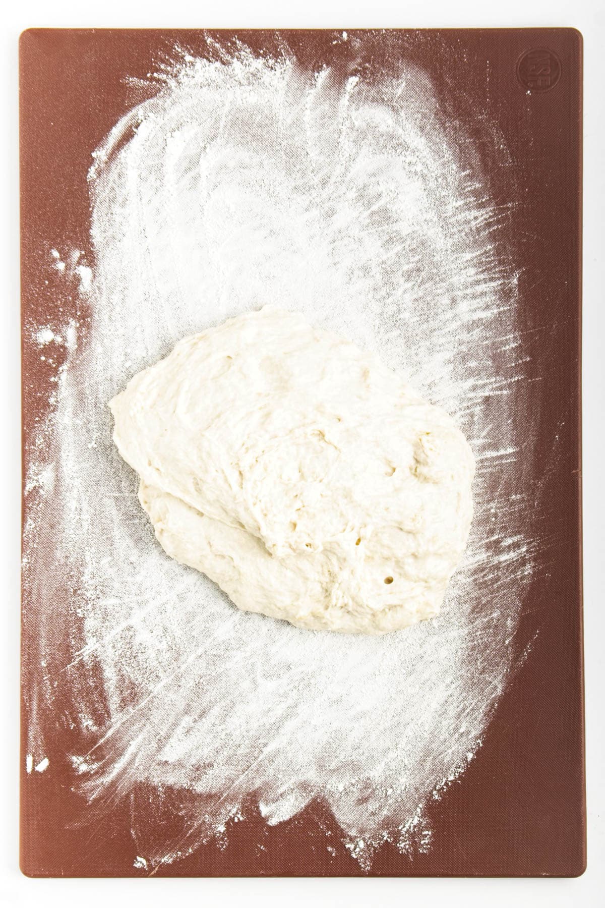 Dough on a cutting board.