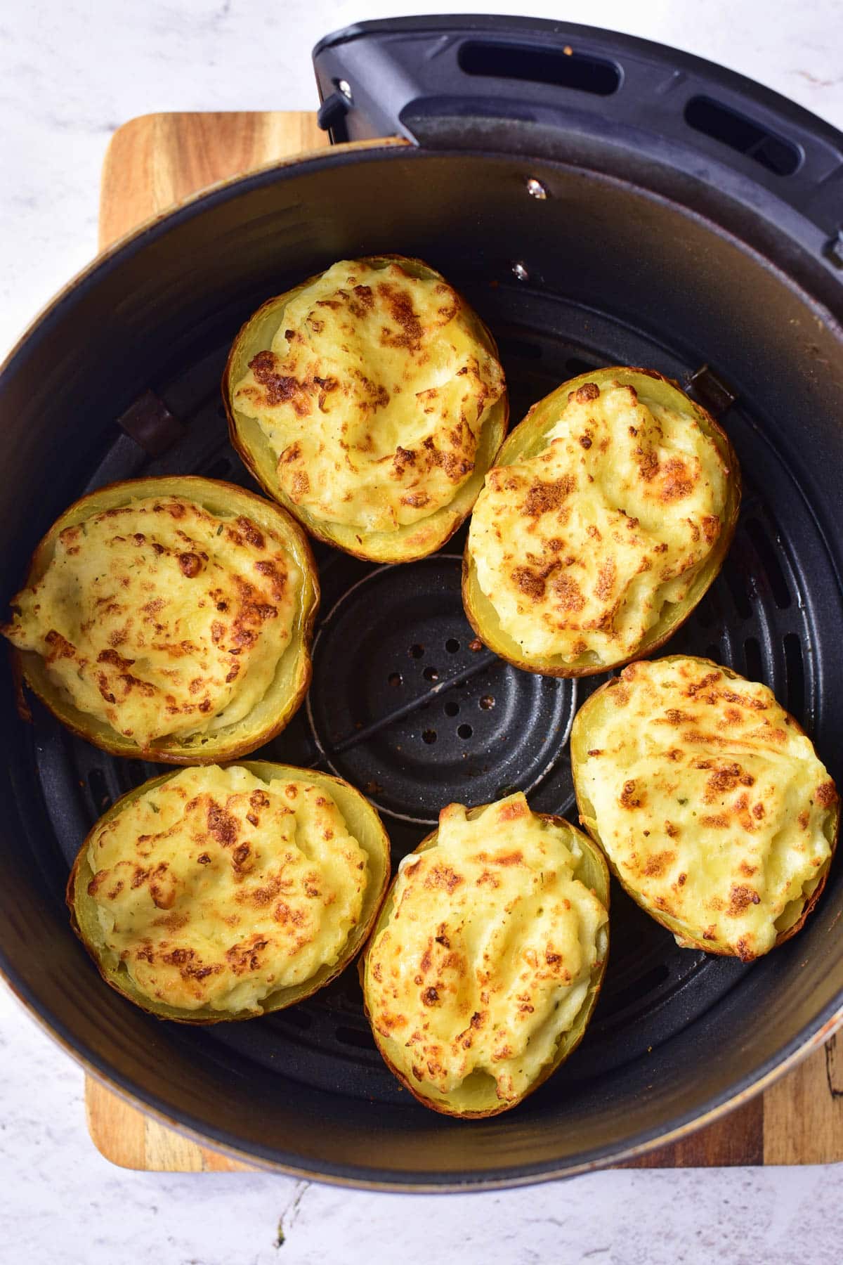 Stuffed potatoes in an air fryer.