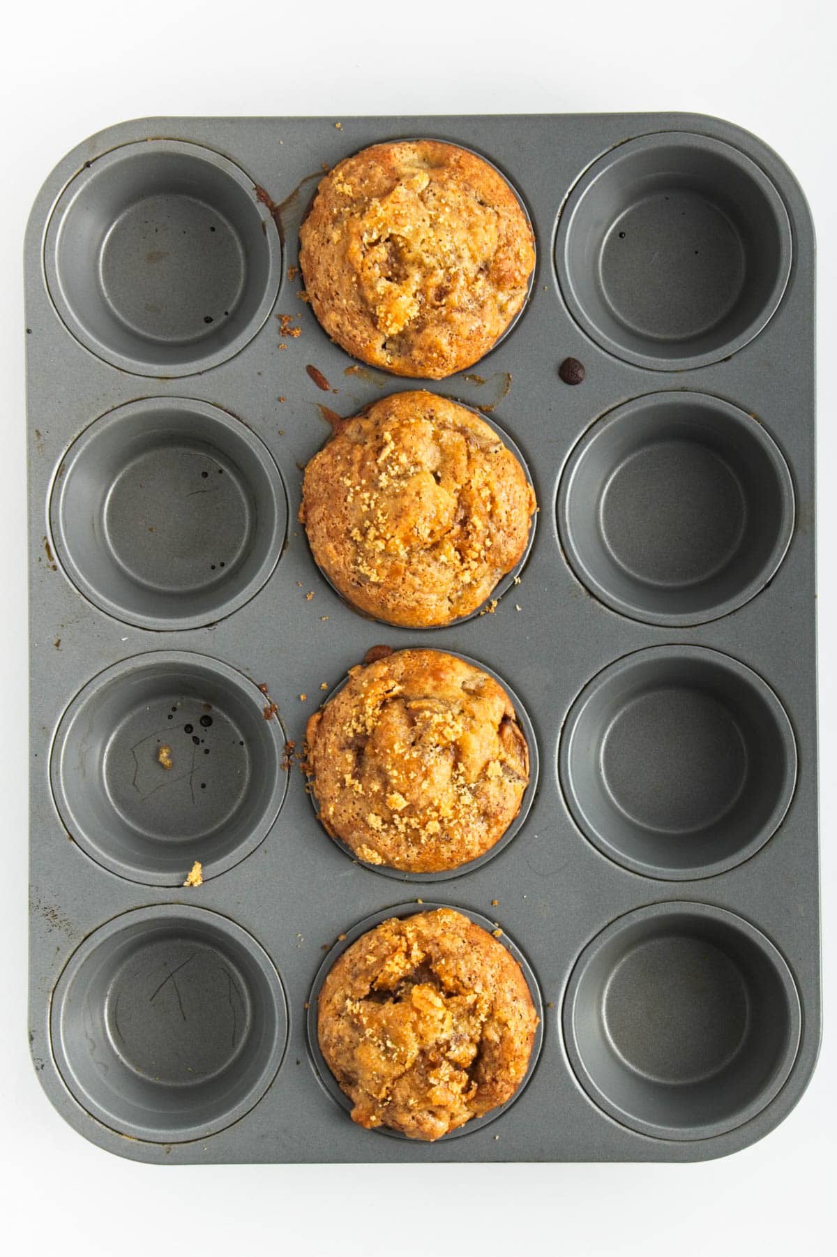 Four muffins in 12 hole muffin tin.