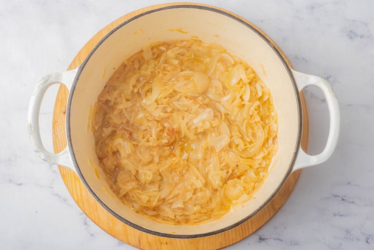 Cooked onions in a pot.