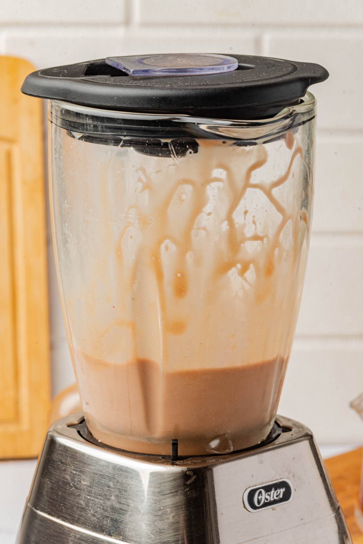 Chocolate milkshake blended in blender.