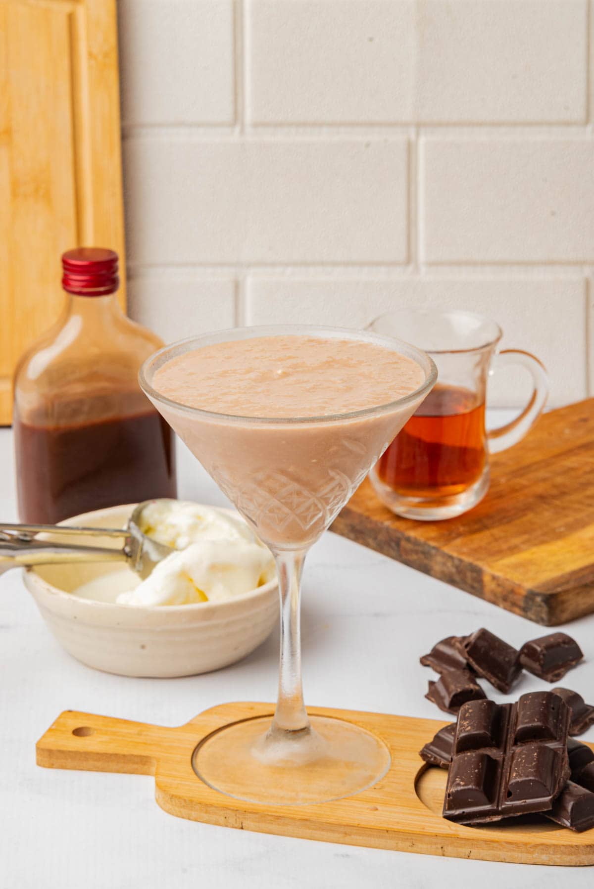 Chocolate frozen drink in a tall cocktail glass.