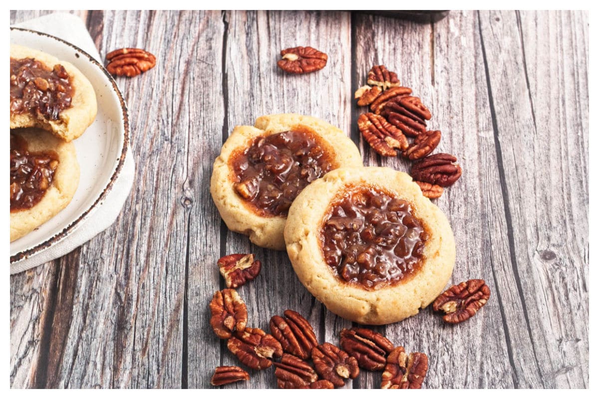 Pecan pie cookies on a wood board.